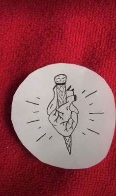 a sticker with a drawing of a hand holding a light bulb on it's side