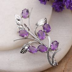 Faceted amethyst, the birthstone of February, casts an enchanting spell in this brooch pin crafted in India. Presented by Alok Jain, the design is made from rhodium-plated sterling silver and faceted purple stones, totaling seven carats and representing your blossoming wisdom. Upcycled Handbag, Ear Cuff Jewelry, Silver Brooch Pin, Cotton Handbag, Curated Gift Boxes, Sterling Silver Brooch, Purple Stones, Men's Jewelry Rings, Silver Brooch