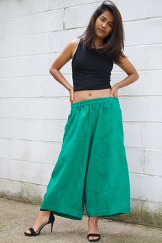 M E A S U R E M E N T S Waist 26 in. up to 40 in. (max with elastic band) Hips up to 54 in. Wide leg circumference 30 in. Inseam 23 in. Pocket 2 pockets Total length 35 in. Material High quality linen fabric M O D E L * Size US4 * Height 5 ft. 4 in. or 163 cm. With or without 4 in. high heels. These pants are a new addition to our linen pants collection. They're made with high quality linen with high end detailing and are tailored to make you look and feel your best! The pants are very roomy wit Summer Green Parachute Pants With Loosely Fitted Hips, Baggy Green Parachute Pants For Summer, Green Relaxed Fit Parachute Pants For Summer, Green Bohemian Bottoms With Relaxed Fit, Green Harem Pants With Elastic Waistband For Beach, Green Harem Pants For Spring, Green Stretch Pants For The Beach, Green Stretch Bohemian Bottoms, Green Stretch Pants For Beach