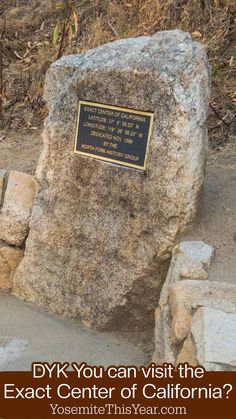 a large rock with a plaque on it that says, dyk you can visit the exact center of california?