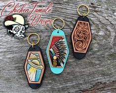 three wooden key chains with different designs on them and the words chicken tamale designs