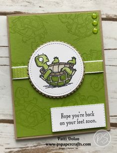 a close up of a card with a turtle on it