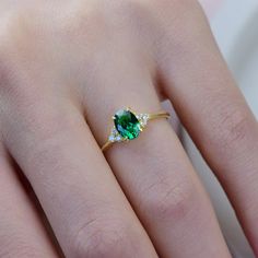 Oval Cut Emerald Ring, Gold Emerald Ring, Emerald Engagement Ring,  Dainty Emerald Ring, Anniversary Ring, Gift For Her, Mothers Day Gift Item Gemstone: Lab Emerald Size: 7*5 - 1*40 Color: Green Shape: Oval Average Quality: AAA+ 🎉All of gold options of the product are produced from solid gold. 🎉While using the product, it's healthier to avoid touching the cream and similar products in terms of cleaning the product. 🎉Items are shown larger in pictures to show details-please note the dimensions Emerald Green Oval Engagement Ring, Luxury Oval Emerald Ring For Gift, Oval Emerald Ring In Yellow Gold For Gift, Gold Emerald Oval Ring For Gift, Oval Emerald Ring Gift, Oval Gold Emerald Ring Fine Jewelry, Emerald Ring Design, Gold Emerald Ring, Engagement Ring Dainty