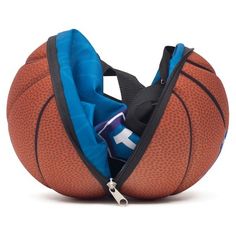 an orange and blue basketball bag filled with items