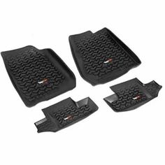 four black rubber floor mats for cars