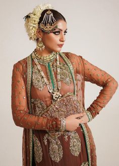 Pakistani Wedding Dress in Brown Sharara and Gown Style is a stunning attire embellished with Naqshi, Dabka, Sequins, Motifs, and Cut-dana. Fast shipping. Brown Sharara, Velvet Palazzo Pants, Velvet Palazzo, Pakistani Gown, Wedding Sharara, Hussain Rehar, Shirt Gown, Sleek Outfit, Pakistani Wedding Dress