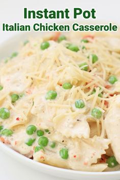 a white bowl filled with pasta and peas