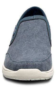 With stretchy insets, this slip-on sneaker keeps you effortlessly comfortable all day on a cushioned footbed featuring contoured support. Textile upper and lining/synthetic sole Imported Comfortable Sports Slip-ons With Arch Support, Synthetic Slip-on Sneakers With Arch Support, Tpr Slip-on Walking Shoes For Sports, Walking Slip-on Sneakers With Arch Support, Slip-on Sneakers With Arch Support For Walking, Slip-on Sneakers For Walking With Arch Support, Functional Synthetic Slip-on Sneakers, Slip-on Low-top Sneakers With Arch Support, Comfortable Slip-ons For Light Sports With Arch Support