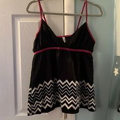 Adorable Sleep Tank; Hot Pink Straps And Piping Are Velvet; Super Cute; Never Worn; Satin-Like Material Black Spaghetti Strap Loungewear Top, Black Casual Camisole Sleepwear, Black Casual Cami Sleepwear, Black Tops With Built-in Bra For Vacation, Black Vacation Tops With Built-in Bra, Pink Sleeveless Victoria's Secret Nightgown, Victoria's Secret Black Sleeveless Sleepwear, Victoria's Secret Sleeveless Sleepwear With Built-in Bra, Victoria Secret Pink Striped Pajamas