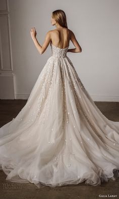 a woman in a wedding dress looking back