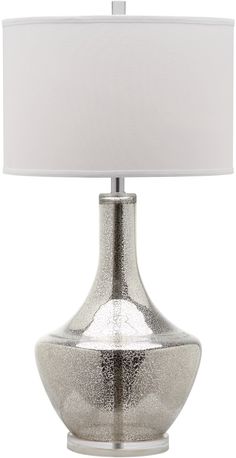 a silver table lamp with a white shade on the base and a light in front of it