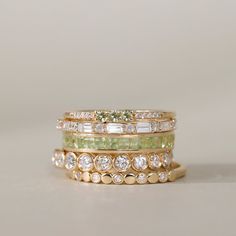 Adorn your finger with our Peridot Full Eternity Ring, a radiant celebration of August's birthstone. This exquisite piece showcases the warm allure of the green gemstone in a princess cut, offering a perfect blend of sophistication and individuality. Elevate your style with this timeless and vibrant symbol of elegance. Full Eternity Ring, Jewelry Lookbook, August Birth Stone, Green Gemstones, Color Ring, Jewelry Inspo, Dream Jewelry, Chic Boutique, Pretty Jewellery