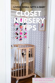 a baby's room with a crib and wallpaper that says closet nursery tips