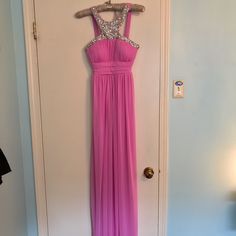 Never Worn! Formal Maxi Dress Pink- Sometimes Looks Light Purple Depending On The Lighting Super Cute Crystal Detail! Slightly Padded Top Pink Floor-length Maxi Dress For Homecoming, Pink Maxi Dress For Spring Homecoming, Pink Sleeveless Maxi Dress For Homecoming, Pink Formal Dress, Formal Maxi Dress, Colorful Dresses Formal, Pink Formal Dresses, Padded Top, Dresses Pink