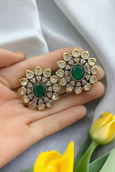 Sabyasachi-inspired Emerald Polki Earrings. Crafted with uncut Polki gems and intricate Jadau Kundan work, these earrings exude timeless elegance. The mesmerizing green doublets evoke a sense of regal charm, while the fusion of tradition and luxury makes them perfect for any occasion. Elevate your style with these exquisite earrings, a true reflection of opulence and grace. *𝐏𝐑𝐎𝐃𝐔𝐂𝐓 𝐃𝐄𝐓𝐀𝐈𝐋* * Material: Brass * Plating: Gold Plated * Stone: Semi Precious Kundan & Polki. *𝐃𝐈𝐌𝐄𝐍𝐒 Green Kundan Bridal Earrings With Stone Work, Green Kundan Earrings With Stone Work, Traditional Kundan Earrings With Stone Setting, Green Polki Earrings, Traditional Kundan Gemstone Earrings, Kundan Studs, Sabyasachi Jewelry, Big Statement Earrings, Kundan Work