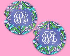 two monogrammed coasters with the letter b and c on them, both decorated in blue and green leaves