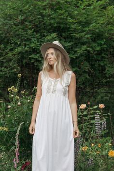 "Sweetest vintage 80's - 90's nightgown! Pale pink soft cotton with white lace and buttons at the chest. Condition: In great vintage condition. Light average wear - no issues to note! Measurements: Seems to best fit a size small - medium Bust: 36\" Waist: 48\" Hips: 48\" Overall Length: 45\" For reference, model is 5'9\"and measures 33/29/39 All measurements are taken flat and then doubled when appropriate. Please let us know if you have any questions about sizing or fit. Please check out the sh Summer Cotton Dresses With Delicate Lace, Summer Nightgown With Delicate Lace For Bedtime, Summer Beach Nightgown With Lace Trim, Summer Delicate Lace Nightgown For Bedtime, Summer Delicate Lace Nightgown, Summer Sleeveless Nightgown With Delicate Lace, Feminine Summer Sleepwear With Lace Patchwork, Feminine Lace Patchwork Sleepwear For Summer, Summer Sleep Dress With Lace Trim