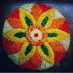 a circular flower arrangement made out of flowers