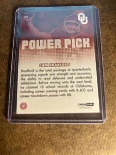 the back side of a card for power pick, which is on top of a table