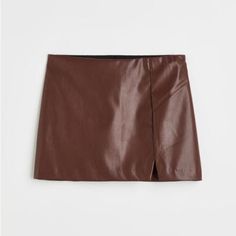 Divided H&M Large Brown Faux Leather Mini Skirt Tags Still Attached. Elastic Waist Line. 100% Polyester. Vegan Faux Leather. Large Size Would Fit Sizes 12-16.