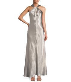 From Antonio Melani&#x2C; this dress features: Drapey satin fabrication Metallic sheen Halter necklineSleevelessA-Line slip silhouetteBack zipper with hook & eye closureFully linedFlounce hemlineMaxi dress length Approx. 46.5" length PolyesterProfessional dry cleaning onlyImported.Dillard's Exclusive. Slip Maxi Dress, Formal Wedding Guest Dress, Chiffon Shawl, Contemporary Dresses, Formal Dresses Gowns, Maxi Gown Dress, Dress Order, Bridesmaid Wedding, Maxi Dress Formal