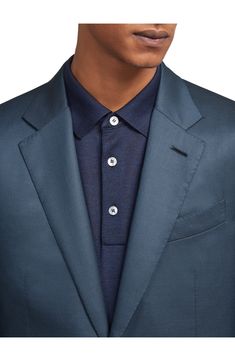 Incredibly high-thread-count wool—named for the Italian word for 120,000—lends a luxurious feel to this impeccable suit. Precise pickstitching showcases the label's scrupulous attention to detail. Jacket has notched lapels, split cuffs, chest welt pocket, front flap pockets, side vents Pants have zip fly; front slant pockets; back button-welt pockets Lined 100% wool Dry clean Made in Italy Men's Designer Clothing Luxury Single-breasted Suits For Semi-formal Occasions, Elegant Blue Sets With Suit Collar, Luxury Suits With Pressed Crease And Lapel Collar, Luxury Suits With Single Button And Suit Collar, Luxury Tailored Suit, Silk Business Casual Suit With Suit Collar, Designer Single Breasted Formal Suits, Luxury Long Sleeve Suits In Suiting Fabric, Designer Single-breasted Formal Suit