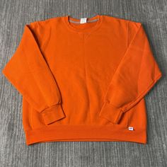 Vintage 2000s Russell Athletic Basic Blank Sportswear Streetwear Y2K Aesthetic Basic Essential Orange Pullover Crewneck Large Mens Condition:  Excellent Used Condition  = No Flaws Measurements: Please see photos above for all measurements IF YOU BUY TWO OR MORE ITEMS USE THE CODE BUNDLE @ CHECK TO SAVE 20% WE SHIP WITHIN 24 HOURS AFTER PURCHASE! Please be aware that we do not offer free returns!! The Buyer is responsible for the cost of the return label.  Follow us on TikTok & Instagram @findsnostalgic and tag us in your finds Casual Solid Color Sweatshirt For Workout, Orange Sporty Crew Neck Hoodie, Orange Crew Neck Sporty Hoodie, Orange Relaxed Fit Sporty Sweatshirt, Solid Winter Sweater For Sports, Casual Activewear For Fall Sports Events, Casual Fall Activewear For Sports Events, Sports Crew Neck Hoodie In Solid Color, Orange Crew Neck Sweatshirt For Streetwear