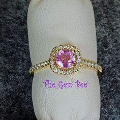 Thank you for coming in! Spectacular petite 14K solid yellow gold ring with 0.6 carat natural pink sapphire cushion center and pave diamond halo(0.25 carat G color, VS-SI clarity). It looks much much nicer in person! SIZE: 6.5 DIMENSION of top: 8.6mm WEIGHT: 0.6 carat sapphire, 0.25 carat diamond, 2.25 Gram total weight MATERIAL: 14K Solid Gold ring, Diamond, Natural Sapphire Pink Sapphire Promise Ring With Halo Design, Pink Diamond Ring With Pave Setting For Gift, Pink Diamond Ring With Pave Setting As Gift, Pink Sapphire Ring With Halo Design As Gift, Pink Sapphire Ring With Halo Design, Pink Gold Pink Sapphire Ring With Halo Setting, Pink Cluster Ring With Halo Setting, Pink Promise Ring With Halo, 5 Dimension