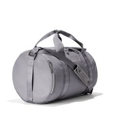 A duffel that does it all? That’s the Large Denver. Pack it up with essentials and extras for that weekend getaway or business trip and stay organized in style. The best traveling duffel bag in grey, Denver can be worn like a backpack for a hands-free carry or like a traditional duffle for ultimate versatility. Built to last with strong, recycled material, this durable duffle will be the travel companion you reach for again and again. Gray Travel Bag With Zipper Closure, Gray Travel Bag With Luggage Sleeve, Gray Functional Gym Bag For Everyday Use, Gray Functional Everyday Gym Bag, Functional Gray Gym Bag For Everyday, Functional Gray Duffle Bag For Everyday Use, Functional Gray Everyday Duffle Bag, Dagne Dover, Duffle Bags