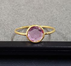 1. 18k Gold Pink Sapphire Ring 2. Made to Order 3. Gemstone - Pink Sapphire 4. Jewelry Type - Gold Ring 5. Total Weight - 1.060 Gram Approx 6. Sapphire Weight - 1.20 Carats 7. Gold Weight - 0.820 Grams Approx. 8. Sapphire Size - 6 MM 9. Gold Purity - 18k 10. Handmade Items 11. Band Size - 1 MM 12. Round Pink Sapphire 13. AAA Quality 14. Stackable Ring 15. 1 Quantity Available 16. Ready to dispatch in 1 - 2 days. Pictures are taken under natural and day light. Rings Adjustable, Gold Ring For Women, Saphir Ring, Friendship Ring, Friendship Rings, Pink Sapphire Ring, Solid Gold Ring, Pink Shade, Solid Gold Rings