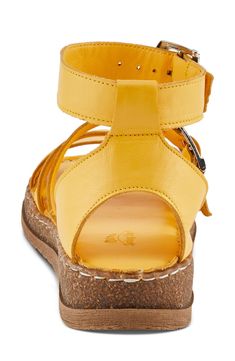 A cushioned footbed and shock-absorbing sole ensure daylong comfort in this supple leather sandal secured with adjustable buckle straps. 1 1/2" heel Adjustable ankle strap with buckle closure Cushioned footbed Leather upper and lining/synthetic sole Made in Turkey Adjustable Ankle Strap Sport Sandals With Leather Footbed, Adjustable Yellow Sandals With Buckle Closure, Yellow Leather Sandals With Heel Loop, Yellow Leather Sandals With Buckle Closure, Yellow Sandals, Strap Sandals Women, Sandal Women, Ankle Strap Sandals, Strap Sandals