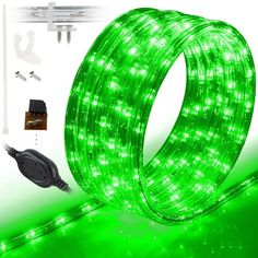 the green light is being used to make an outdoor christmas decoration with wires and other accessories