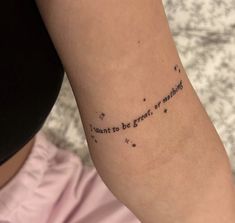 a woman's arm with a tattoo saying i want to be good or nothing