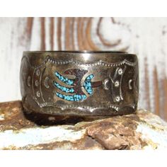 For your consideration is this wonderful vintage Navajo Sterling Silver Bracelet. This timeless piece showcases intricate tribal design turquoise and coral inlay within an ingot hand-stamped design, reflecting the rich heritage of Navajo craftsmanship. Measuring approximately 1" in width, it offers a perfect blend of elegance and cultural significance. With a wrist size range of 6-7" including an opening. Embrace the spirit of Navajo artistry with this extraordinary bracelet. Traditional Stamped Turquoise Jewelry, Traditional Hand Tooled Turquoise Jewelry, Traditional Hand-tooled Turquoise Jewelry, Vintage Turquoise Bracelets With Hand Tooling, Vintage Turquoise Hand-tooled Bracelets, Antique Stamped Turquoise Jewelry, Vintage Hand Tooled Turquoise Jewelry, Vintage Native American Jewelry, Native American Necklace