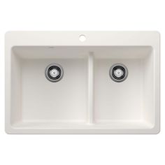 white double bowl kitchen sink with two faucets on the front and one side