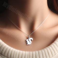 Available in multiple sizes and metal options ✨ Chain not included ❌ Gift packaging included 💕 Elevate your style with our minimalist Squirrel Charm Pendant! Crafted with sleek lines and understated elegance, this charming pendant is perfect for those who appreciate simplicity and natural beauty. Made from high-quality sterling silver, the realistic squirrel design exudes a sense of quiet sophistication, making it a versatile accessory for any occasion. Whether you're treating yourself or surprising a loved one, this squirrel charm pendant is a timeless addition to any jewelry collection. Embrace minimalist chic with our Squirrel Charm Pendant and add a touch of understated charm to your everyday look! Shop now and let your style shine with simplicity. Squirrel Jewelry, Squirrel Design, Squirrel Gift, Schmuck Gold, Minimalist Chic, Pendant Gold, Understated Elegance, Jewelry Gold, Gift Packaging