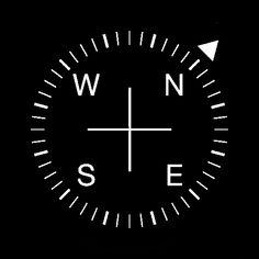 a black and white compass with the word w n s e on it