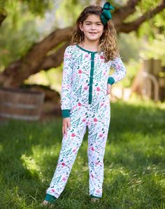 Let your kids join in on the festive fun with the Andes Kids Onesie - a holiday-themed loungewear onesie. Bring the whole family together with a matching Mom's Andes Onesie for a perfect bit of holiday cheer. 
   
 
 Snap button closure  
 
   
 Model Measurements : 
 
 Reese is wearing a size M 
 Height: 4'0 
 Bust: 22 1/2 inches  
 Waist: 20 1/2 inches 
 Hips: 25 1/2 inches Casual Christmas Loungewear Onesie, Christmas In The City, Beach Bunny Swimwear, Hawaii Surf, Family Together, Matching Mom, Beach Bunny, Swim Bottoms, Cover Up Dress