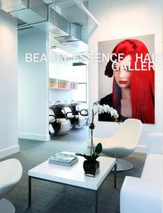 a salon with chairs, tables and pictures on the wall above them that say beauty essentials gallery