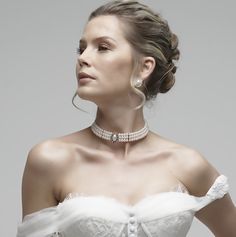 An elegant versatile Three-strand pearl choker comes with a matching pair of stud earrings. This set is a lovely addition to your modern, classic, or vintage-inspired wedding. Bridal jewelry set, Bridal choker necklace earrings, Wedding choker, white Victorian pearl jewelry set, bridesmaid jewelry, choker set, evening jewelry, party jewelry , vintage inspired jewelry • Color : White, Silver, Clear • Theme : Pearl • Necklace Size : 11" to 14" adjustable • Decor Size : 1" L • Bracelet Size : 1" H Wedding Dress Choker, Wedding Necklaces For Bride, Pearl Choker Wedding, Bridal Choker Necklace, Pearl Jewelry Set, White Victorian, Pearl Bride, Choker Dress, Evening Jewelry