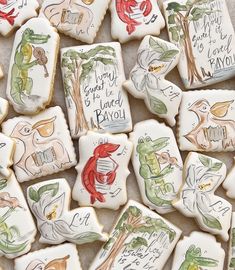 some decorated cookies with writing on them