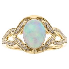 Decorate yourself in elegance with this Ring is crafted from 10-karat Yellow Gold by Gin & Grace Ring. This Ring is made up of 9x7 mm Oval-cab Ethiopian Opal (1Pcs) 1.40 Carat and Round-cut White Diamond (54 Pcs) 0.18 Carat. This Ring is weight 2.62 grams. This delicate Ring is polished to a high finish shine. Ethiopian Opal Ring, Delicate Rings, Yellow Gold Ring, Gem Stone, Opal Rings, Yellow Gold Rings, Ethiopian Opal, White Diamond, Gold Ring