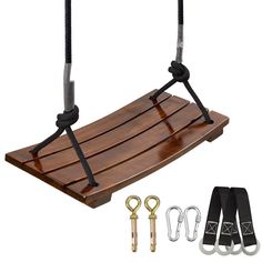 an image of a wooden swing with two handles and hooks on the bottom, along with other accessories