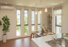 the kitchen is clean and ready to be used as a living room or dining area