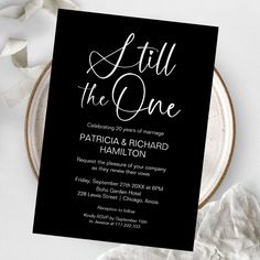 a black and white wedding card with the words,'still the one'on it