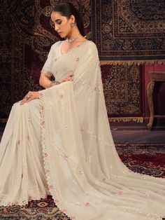 Introducing an exquisite off-white georgette saree that epitomizes elegance and grace, perfect for weddings, festivals, parties, and other special occasions. This beautiful saree is meticulously crafted from high-quality silk georgette fabric, combining the softness of silk with the lightweight and flowy texture of georgette. The off-white hue adds a touch of sophistication, making it a versatile addition to your ethnic wardrobe.
The saree is adorned with intricate sequin work, which shimmers de Full Coverage Outfit, Organza Kurti, Batik Print Dress, Dupion Silk Saree, Lehenga Crop Top, Anarkali Lehenga, Dresses Traditional, Reception Gown, Party Sarees