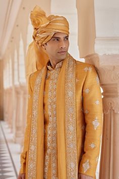 Orange peel raw silk sherwani with zardosi, french knots and aari embroidery. Comes with churidar, a kurta and a dupatta. - Aza Fashions Festive Bandhgala With Zari Work In Traditional Fit, Festive Bandhgala With Zari Work, Traditional Bandhgala With Chikankari Embroidery In Art Silk, Traditional Fit Bandhgala For Eid, Eid Traditional Bandhgala, Traditional Bandhgala With Intricate Embroidery In Art Silk, Traditional Fit Sherwani With Zari Work For Eid, Traditional Fit Sherwani With Intricate Embroidery For Diwali, Eid Sherwani With Zari Work In Traditional Fit