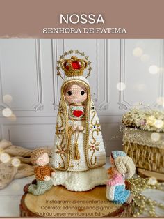 a small figurine on top of a table next to a basket and cake