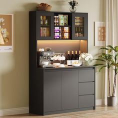 a small bar with drinks and snacks on it in the corner of a room next to a potted plant