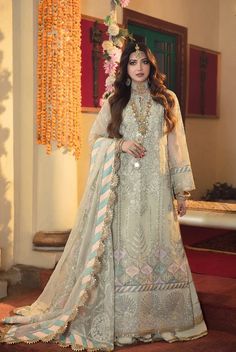 100% Original Brand New Gisele Sajni Wedding Collection - Jasmine 4 Piece Embroidered Suit Description Jasmine is an ivory dress with eye-catching designs created from carefully placed sequin embellishments. The embroidered dupatta gives it an added bit of grace, creating a wonderful sense of completeness to the entire dress. Fabric Details Front Sequins Embroidered Center Panel on Organza Sequins Embroidered Left Panel on Organza Sequins Embroidered Right Panel on Organza Back and Sleeves Sequins Embroidered Center Panel for Back on Organza Sequins Embroidered Right Panel for Back on Organza Sequins Embroidered Left Panel for Back on Organza Sequins Embroidered Sleeves on Organza Dupatta Sequins Embroidered Dupatta on Organza Extensions Embroidered border for front and back on Organza Emb Beige Georgette Traditional Wear For Reception, Cream Semi-stitched Gown For Eid, Semi-stitched Sharara With Dupatta For Ceremony, Unstitched Ceremony Set With Dupatta, Festive Dabka Work Wedding Dress For Ceremony, Festive Wedding Dress With Dabka Work For Ceremony, Semi-stitched Wedding Dress With Intricate Embroidery, Semi-stitched Sharara For Eid Ceremony, Semi-stitched Gown With Zari Work For Ceremonies